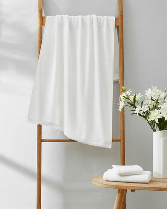 Juliette Lace Hem White 3 Piece Towel Set View of hanging towel