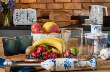 China Blue small kitchen appliance collection in a kitchen on a counter.