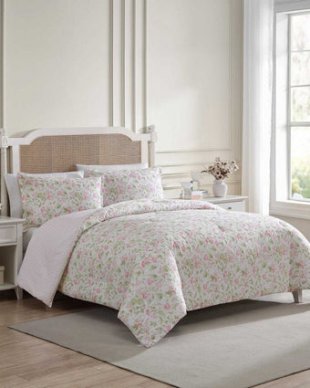 Morning Gloria Cotton Pink Comforter Set on a bed