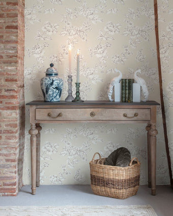 Pollington Roses Natural Wallpaper on a wall.