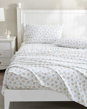 Roseford Cotton Percale White and Soft Orange Sheet Set Sheet Set on bed