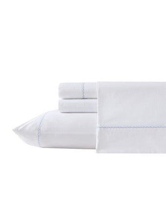 Scallop Embroidered Cotton Blue Sheet Set View of folded sheet set