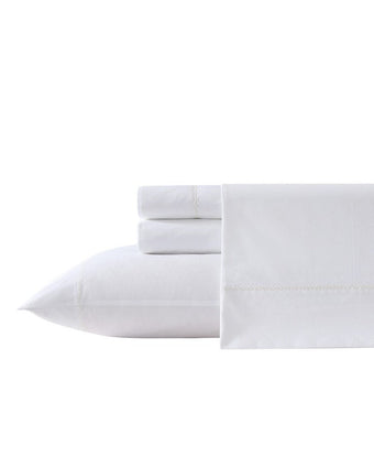 Scallop Embroidered Cotton Ivory Sheet Set View of folded sheet set