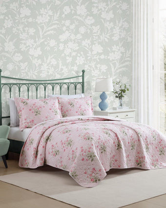 Veronicas Bouquet Pink Quilt Set in a room setting