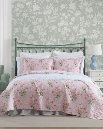 Veronicas Bouquet Pink Quilt Set in a room setting