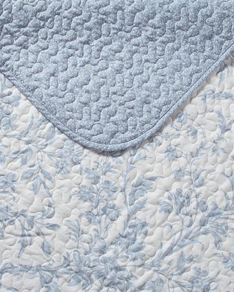 Amberley Bright Blue Reversible Quilt Bonus Set close up view of reversible quilt