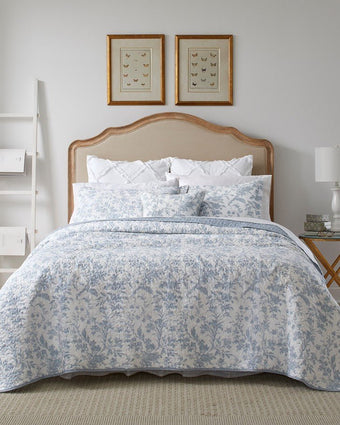 Amberley Bright Blue Reversible Quilt Bonus Set front view of quilt, 2 shams and 1 pillow cover