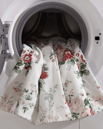 Ashfield Bright Red Cotton Flannel Reversible Comforter Set angle view of comforter in a dryer