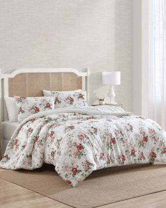 Ashfield Bright Red Cotton Flannel Reversible Comforter Set angle view of comforter on a bed