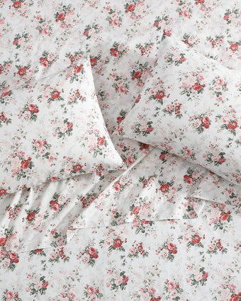 Ashfield Pink Cotton Percale Sheet Set close up view of sheets and pillowcases