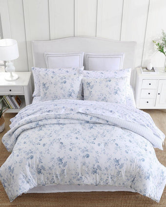 Belinda Blue Comforter Set Over head view of comforter sheets and shams on a bed