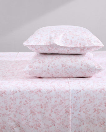 Bella Pink Cotton Sateen Sheet Set - Close-up view of sheets on bed