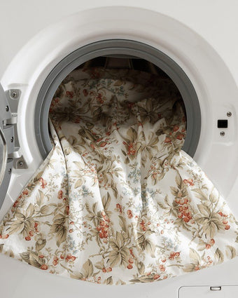 Bramble Floral Beige Cotton Reversible Comforter Set view of comforter in a dryer