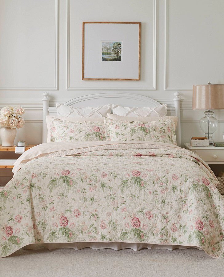 https://www.lauraashleyusa.com/cdn/shop/products/breezy-floral-pink-quilt-set-218028.jpg?v=1658416310