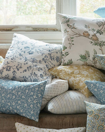 Campion Pale Newport Blue Fabric view of print on cushions