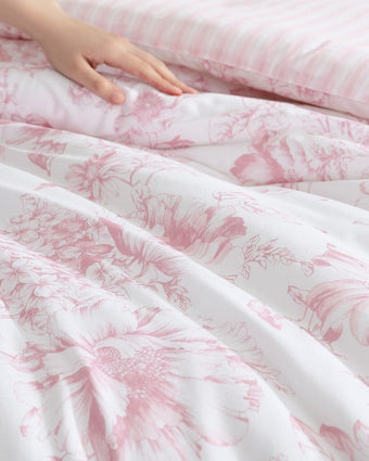 Delphine Pink Comforter Set Close up view of floral and stripe print