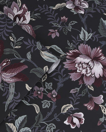 Edita’s Garden Charcoal Grey Wallpaper view of wallpaper and a roll of wallpaper