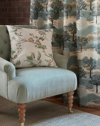 Elderwood Fern Green view of fabric on a cushion