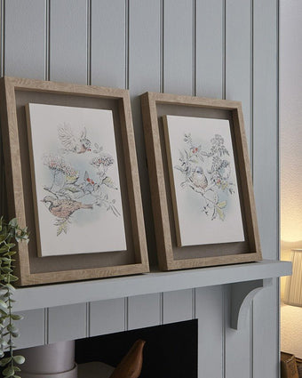 Elderwood Framed Floating Canvas Wall Art Set of 2  sitting on mantel