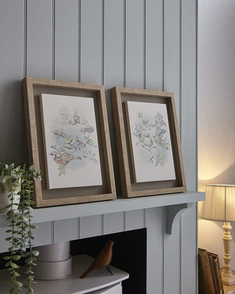 Elderwood Framed Floating Canvas Wall Art Set of 2  sitting on mantel