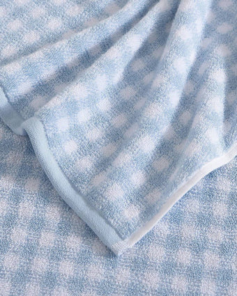 Ginny Blue Cotton Terry 3 Piece Towel Set - Close up view of  corner / hem of towel