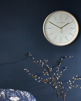 Glenn Gold Contemporary Metal Clock - View of clock hanging on the wall