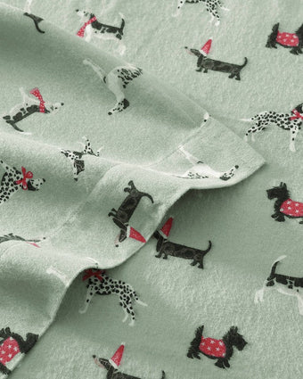 Holiday Pups Green Cotton Flannel Sheet Set view of hem on sheet