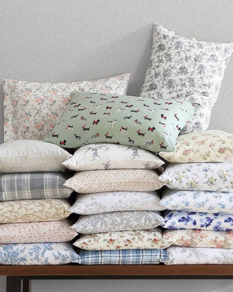 Holiday Pups Green Cotton Flannel Sheet Set view of available prints in pillowcases