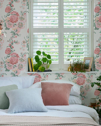 Hollyhocks Coral Pink Wallpaper - View of wallpaper on a wall