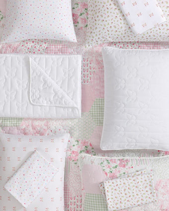 Kids Butterfly Kiss White Microfiber Reversible Quilt Set - View of available printed sheet sets and quilts