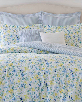 Nora Sun Blue Comforter Bonus Set close up of comforter and pillows
