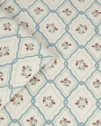 Pinford Trellis Pale Seaspray Blue Wallpaper view of wallpaper and a roll of wallpaper