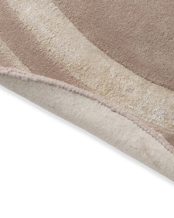 Redbrook Hazelnut Rug view of back of round rug