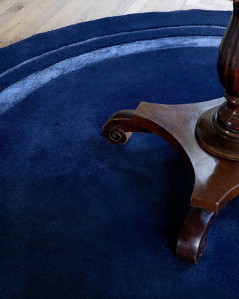 Redbrook Midnight Rug view of round rug in a room