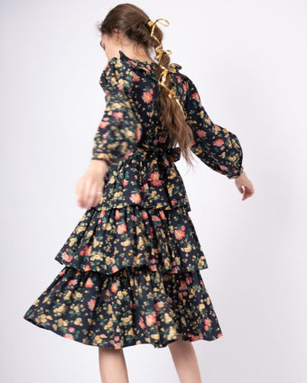 Rhian Daisy Welsh Dress - Side / back view of dress on model
