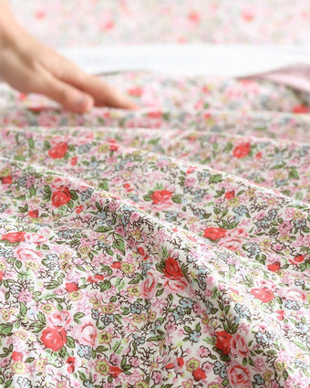 Rowena Pink Quilt - Close up view of floral print 