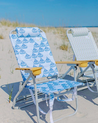 Sailboats Dune High Backpack Beach Chair on a beach during sunny day