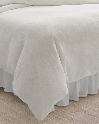 Solid Faux Fur Natural Duvet Cover Set - Corner view of duvet cover on a bed