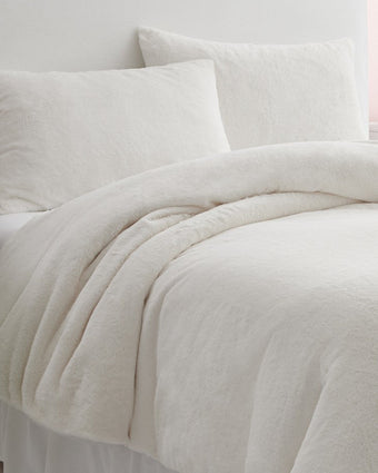 Solid Faux Fur Natural Duvet Cover Set - Close up view of duvet cover and shams on a bed