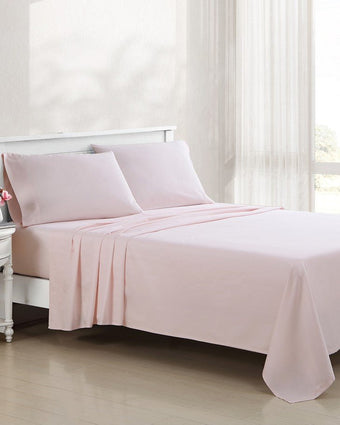 Solid Pastel Pink 800 Thread Count Sheet Set - View of sheet set on bed