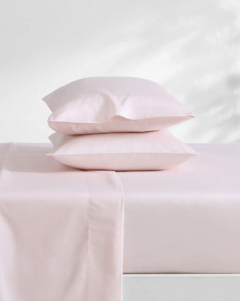Solid Pastel Pink 800 Thread Count Sheet Set - View of sheets on bed