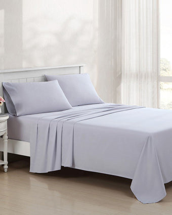 Solid Pastel Purple 800 Thread Count Sheet Set - Full view of sheets on a bed