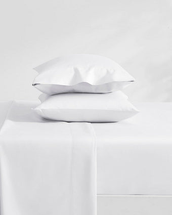 Solid White 800 Thread Count Sheet Set View of sheet set on a bed