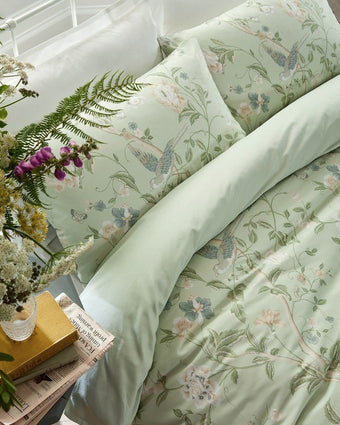 Summer Palace Eau De Nil Duvet Cover Set - Closeup view of duvet cover and pillowcases on a bed