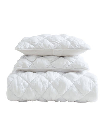 Susanna White Microfiber Quilt Set View of folded quilt and 2 shams