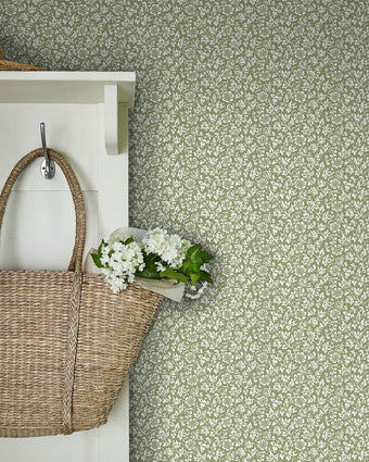 Sweet Alyssum Moss Green Wallpaper view of wallpaper on a wall