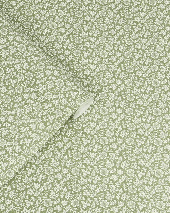 Sweet Alyssum Moss Green Wallpaper view of wallpaper and roll of wallpaper