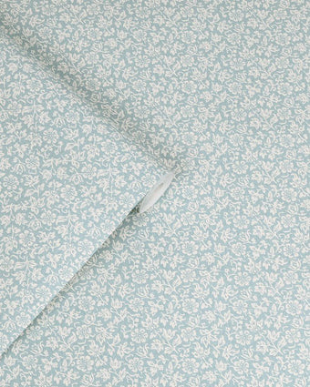 Sweet Alyssum Pale Seaspray Blue Wallpaper view of wallpaper and a roll of wallpaper