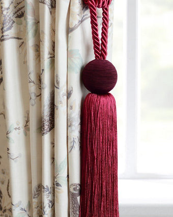 Theodora Tieback - Cranberry - View of tieback on curtain