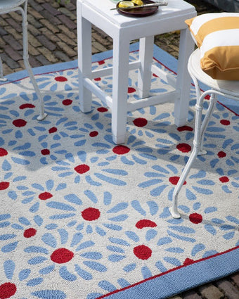 Thorncliff Sky Blue Indoor Outdoor Rug view of rug outside